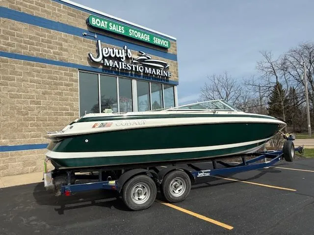 Slide: The Image of 1995 Cobalt 252 boat on trailer at Jerry's Majestic Marine dealership. - 2