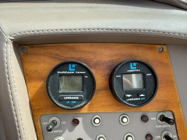 Slide: The Image of Dashboard of 1995 Cobalt 252 boat with Lowrance surface temp and depth gauges. - 9