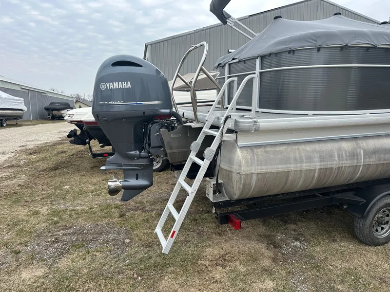 Slide: The Image of 2021 Godfrey Sweetwater 2486 SB pontoon boat with Yamaha outboard motor and ladder. - 12