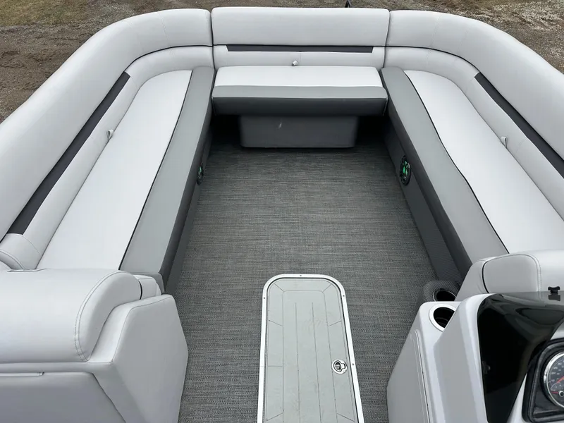 Slide: The Image of 2021 Godfrey Sweetwater 2486 SB boat interior with spacious seating and modern design. - 17