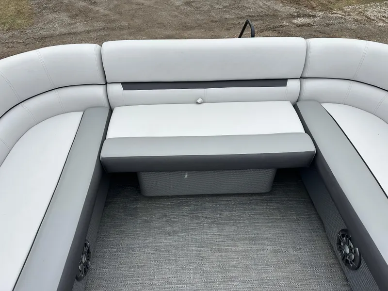 Slide: The Image of 2021 Godfrey Sweetwater 2486 SB boat interior with gray cushioned seating. - 22