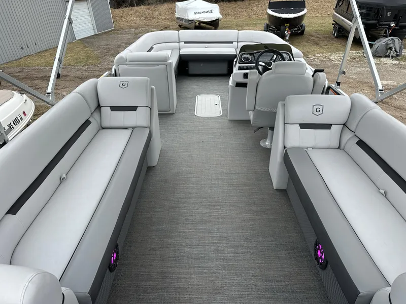 Slide: The Image of 2021 Godfrey Sweetwater 2486 SB pontoon boat interior with spacious seating and modern design. - 3
