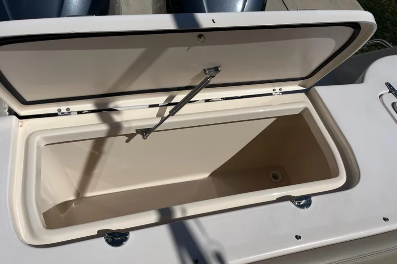 Slide: The Image of Open storage compartment on 2013 Grady-White Freedom 307 boat. - 18
