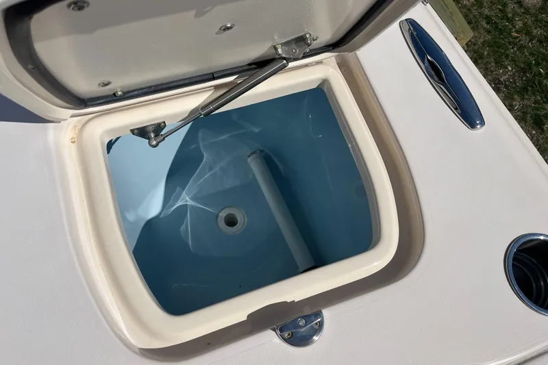 Slide: The Image of Open storage compartment on 2013 Grady-White Freedom 307 boat. - 19