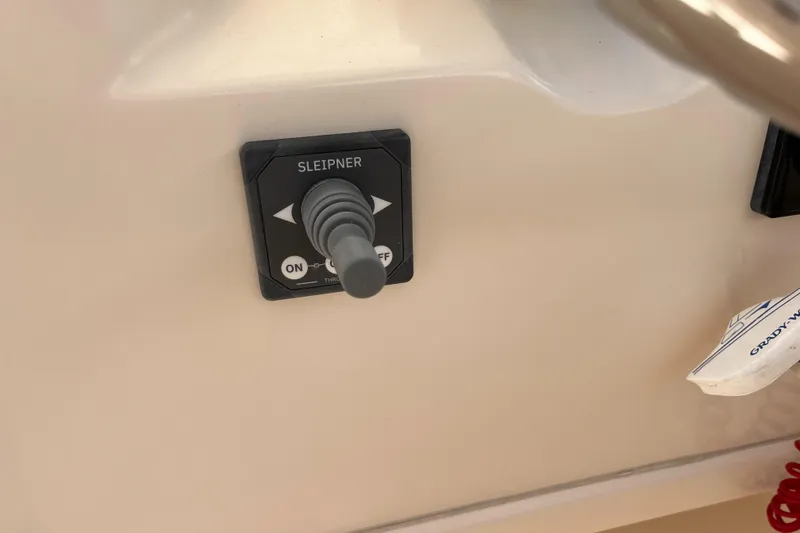 Slide: The Image of Joystick control panel on a 2013 Grady-White Freedom 307 boat. - 29