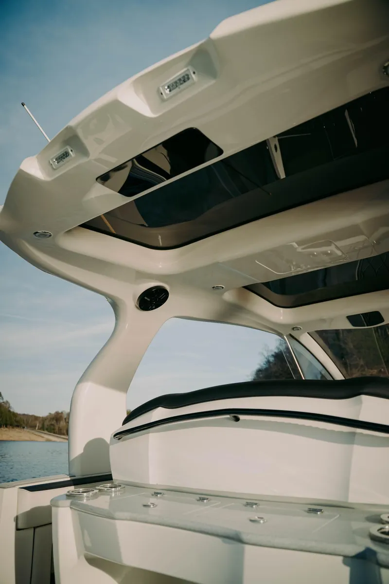 Slide: The Image of 2021 Deep Impact 399 Sport boat interior with sleek design and modern features. - 13