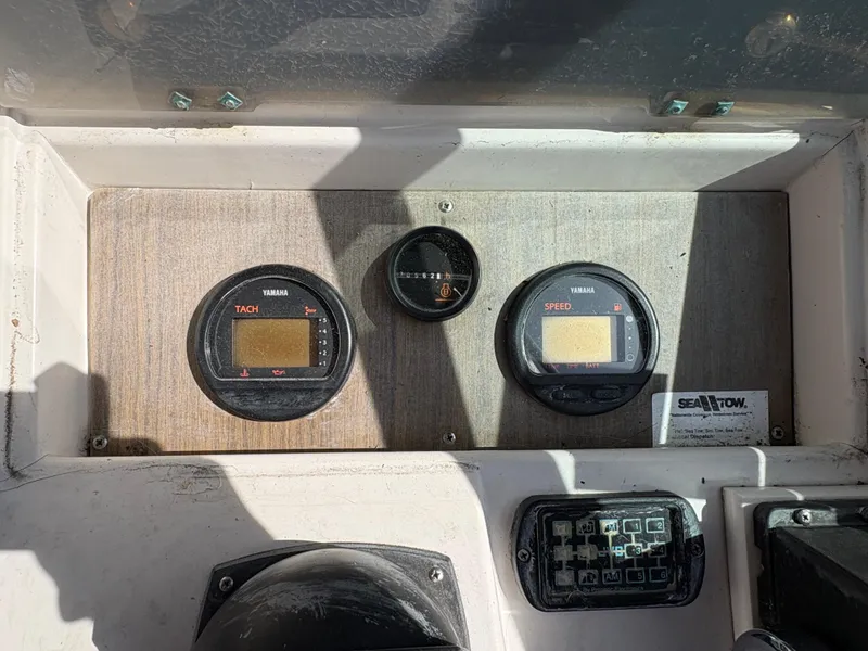 Slide: The Image of Dashboard of a 1988 Grady-White 22 Seafarer boat with Yamaha gauges. - 10