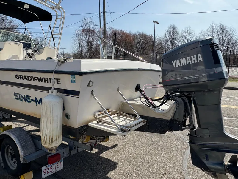 Slide: The Image of 1988 Grady-White 22 Seafarer boat with Yamaha outboard motor on trailer. - 5