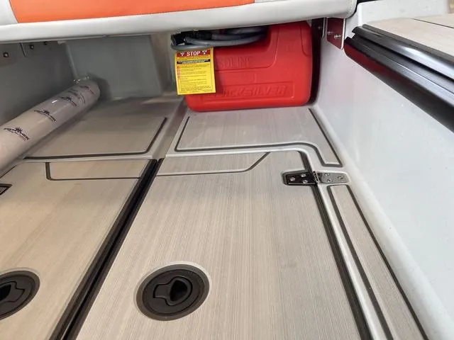 Slide: The Image of Boat storage compartment with red fuel tank, Veer V13, 2023 model. - 12