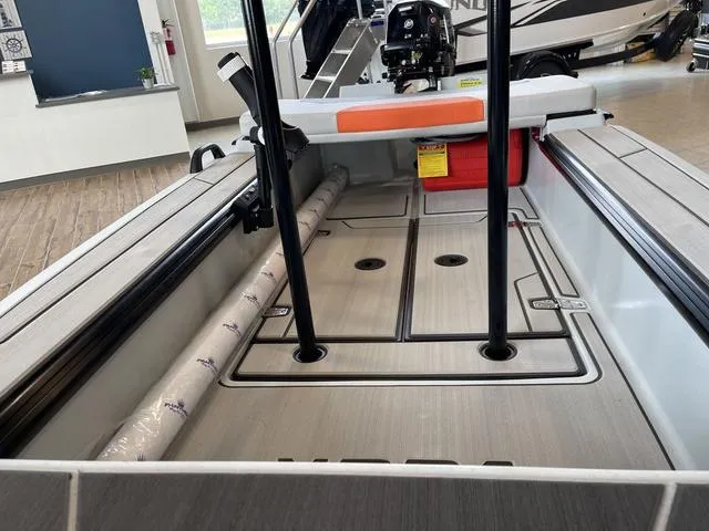 Slide: The Image of 2023 Veer V13 boat interior with storage compartments and modern design. - 7