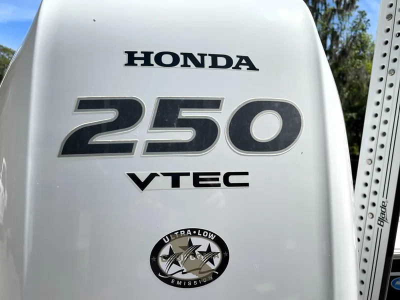 Slide: The Image of Honda 250 VTEC outboard engine on 2020 Tidewater 2300 Carolina Bay boat. - 16