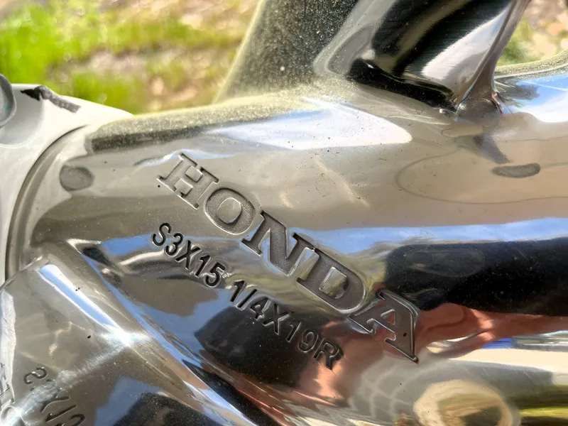 Slide: The Image of Close-up of Honda propeller on 2020 Tidewater 2300 Carolina Bay boat. - 18