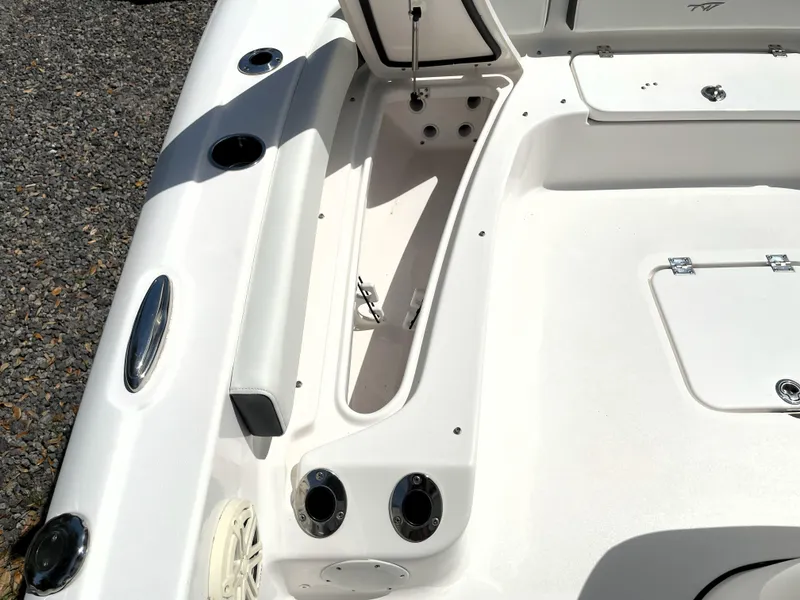 Slide: The Image of 2020 Tidewater 2300 Carolina Bay boat interior with storage compartment open. - 29
