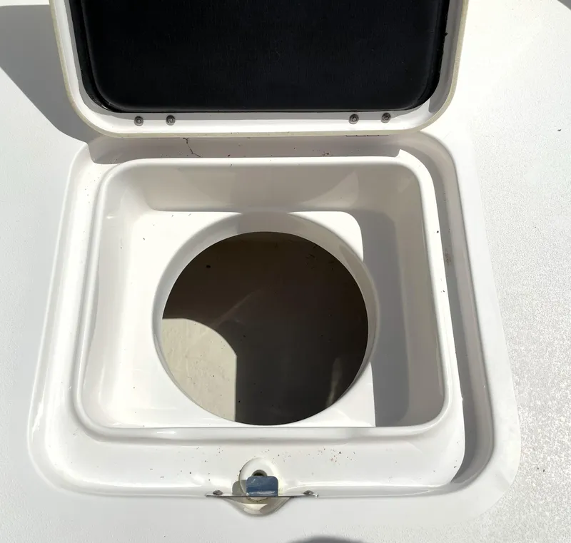 Slide: The Image of Open storage compartment on 2020 Tidewater 2300 Carolina Bay boat. - 32