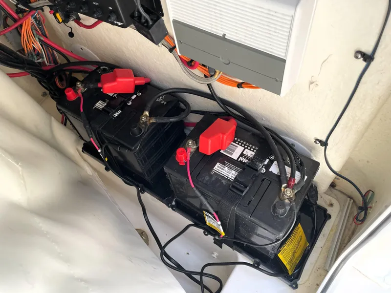 Slide: The Image of Batteries and wiring inside a 2020 Tidewater 2300 Carolina Bay boat. - 42