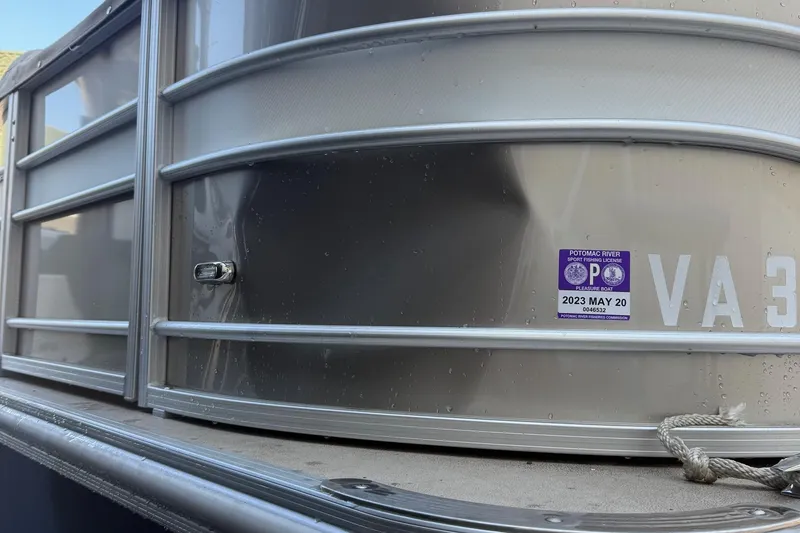 Slide: The Image of 2019 Sylvan 8520 Mirage F-n-C pontoon boat with registration sticker, side view. - 10