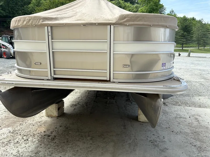 Slide: The Image of 2019 Sylvan 8520 Mirage F-n-C pontoon boat with cover, parked on blocks. - 13