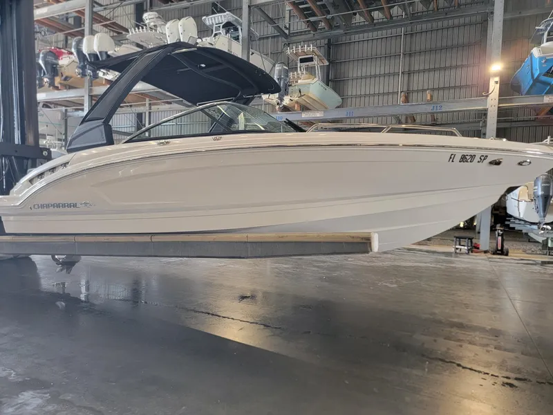 The Image of 2019 Chaparral 237 SSX boat in a storage facility, side view. - 1