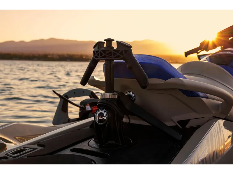 Slide: The Image of 2025 Sea-Doo Wake Pro 230 jet ski at sunset on a serene lake. - 9