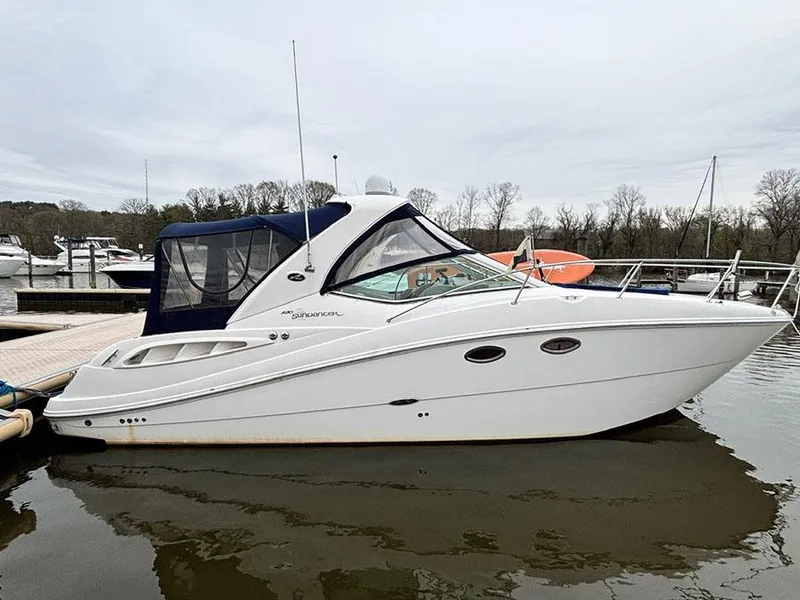 The Image of 2006 Sea Ray 290 Sundancer boat docked at marina, side view. - 0