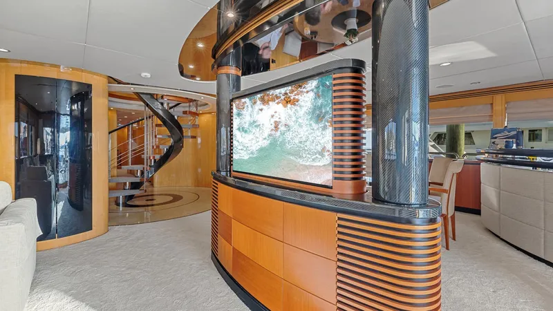Slide: The Image of Luxurious interior of 2005 New Zealand Yachts Wave Piercer with modern design and spiral staircase. - 24