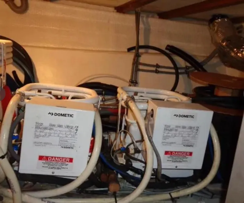 Slide: The Image of Engine room of 1989 Hatteras 67 Cockpit Motor Yacht with Dometic equipment. - 38