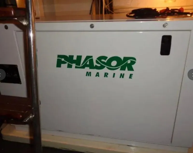 Slide: The Image of Phasor Marine generator on 1989 Hatteras 67 Cockpit Motor Yacht. - 39