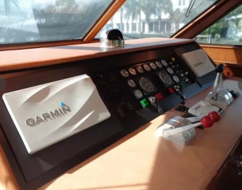 Slide: The Image of Control panel of 1989 Hatteras 67 Cockpit Motor Yacht with Garmin navigation system. - 4