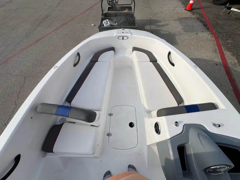 Slide: The Image of 2022 Tahoe T16 boat interior with seating and storage compartments. - 25