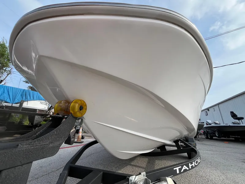 Slide: The Image of 2022 Tahoe T16 boat on trailer, viewed from the front, showcasing sleek design. - 3