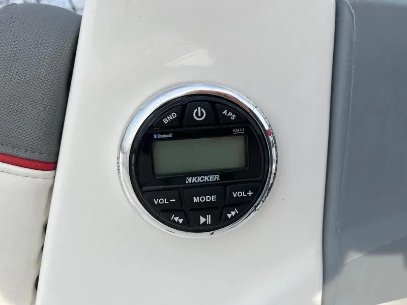 Slide: The Image of Kicker audio control panel on 2022 Tahoe T16 boat dashboard. - 30