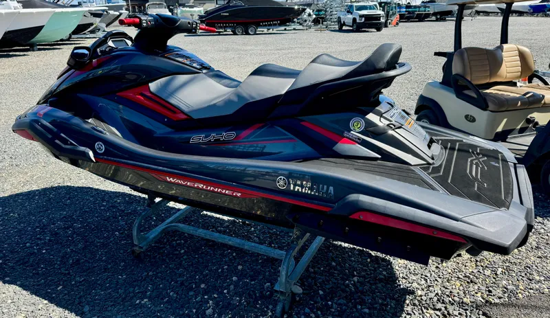 Slide: The Image of 2019 Yamaha WaveRunner FX Cruiser SVHO jet ski on display outdoors. - 2