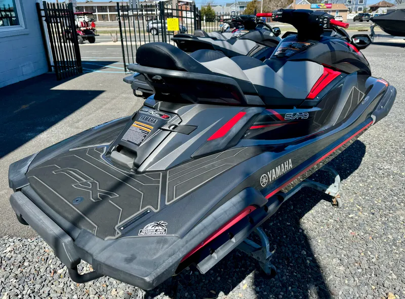 Slide: The Image of 2019 Yamaha WaveRunner FX Cruiser SVHO in a parking lot, showcasing sleek design and features. - 3