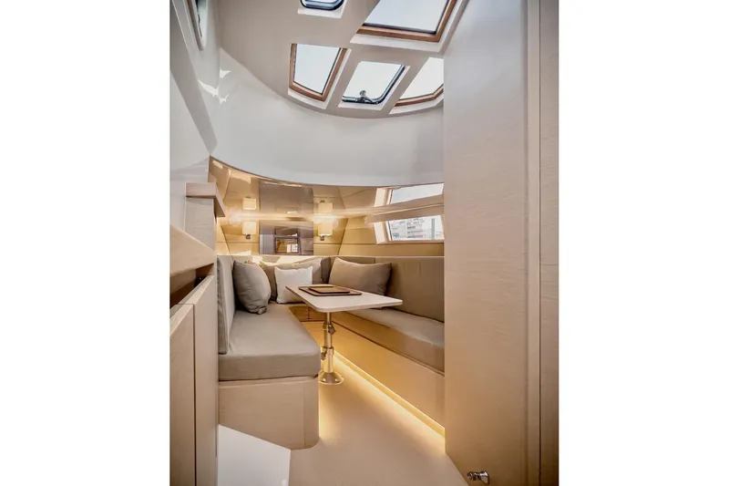 Slide: The Image of 2022 Tesoro T40 Inboard yacht interior with modern seating and skylights. - 16