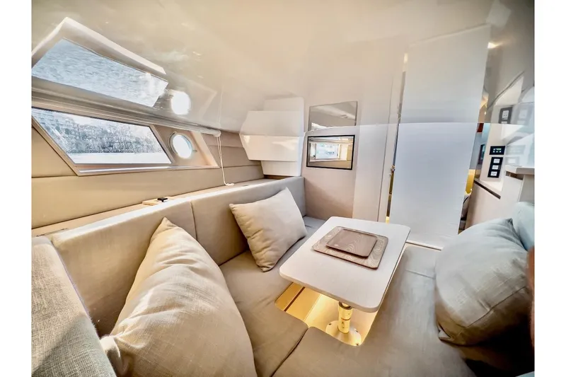 Slide: The Image of Luxurious interior of 2022 Tesoro T40 Inboard yacht with modern seating and elegant design. - 23