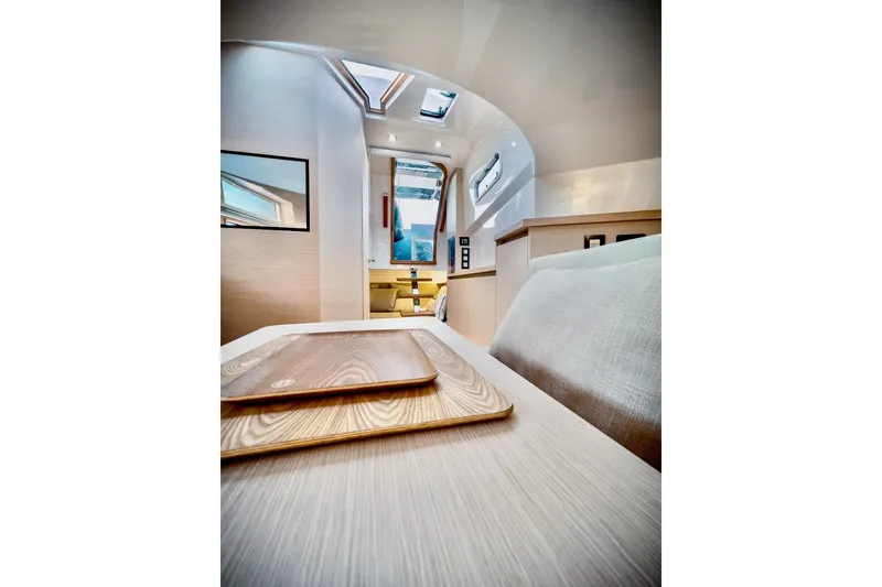 Slide: The Image of Interior of 2022 Tesoro T40 Inboard yacht, featuring modern design and skylights. - 26