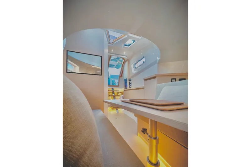 Slide: The Image of Interior of 2022 Tesoro T40 Inboard yacht, featuring modern design and ambient lighting. - 28