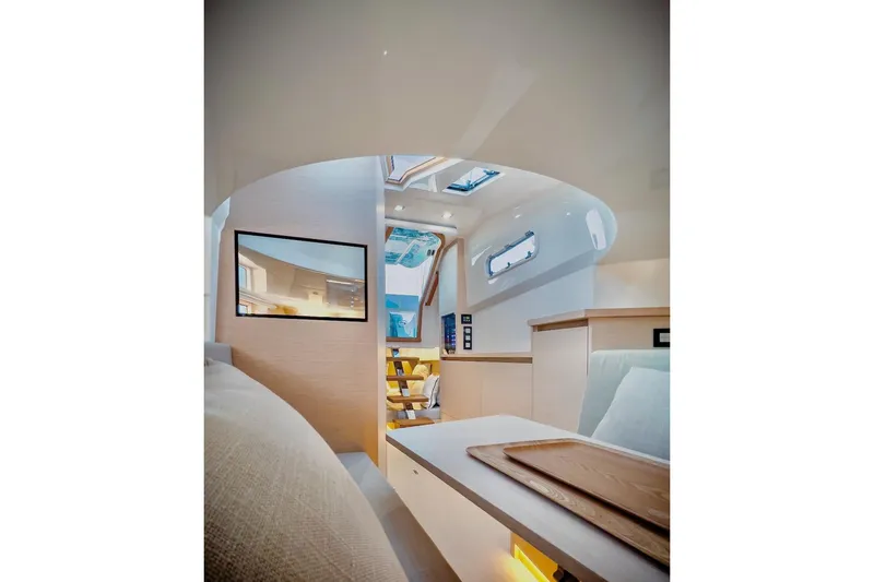 Slide: The Image of 2022 Tesoro T40 Inboard yacht interior with modern design and skylights. - 29
