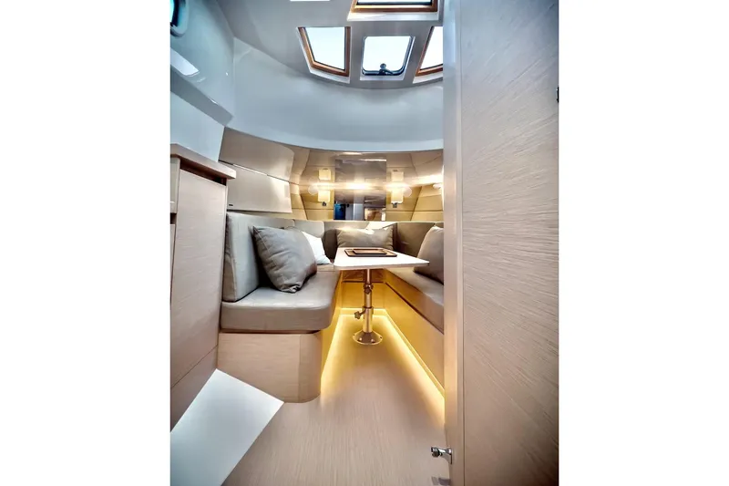 Slide: The Image of 2022 Tesoro T40 Inboard yacht interior with modern seating and ambient lighting. - 30
