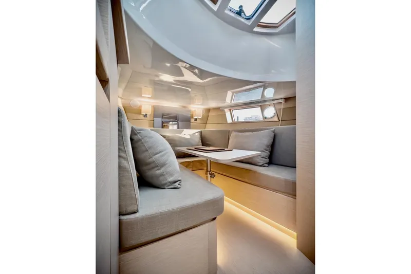 Slide: The Image of Luxurious interior of 2022 Tesoro T40 Inboard yacht with modern seating and ambient lighting. - 32