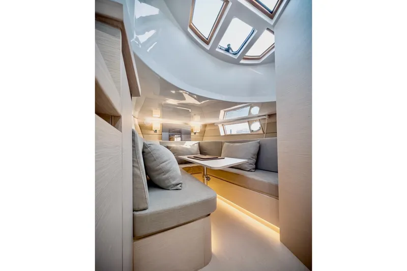 Slide: The Image of Luxurious interior of 2022 Tesoro T40 Inboard yacht with modern seating and ambient lighting. - 33