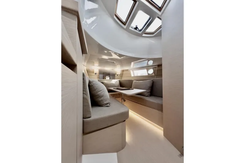 Slide: The Image of Luxurious interior of 2022 Tesoro T40 Inboard yacht with modern seating and skylights. - 34