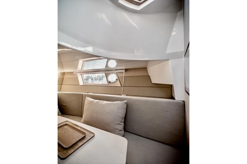 Slide: The Image of 2022 Tesoro T40 Inboard interior with modern seating and windows. - 43