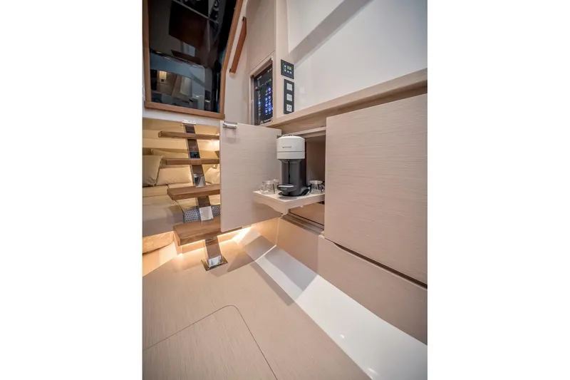 Slide: The Image of Modern interior of 2022 Tesoro T40 Inboard yacht with sleek cabinetry and lighting. - 44