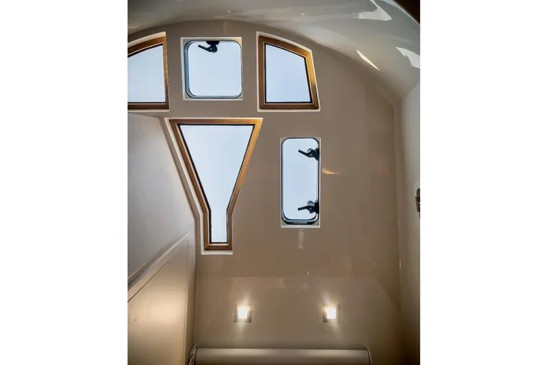 Slide: The Image of Interior view of 2022 Tesoro T40 Inboard yacht with unique window design. - 48