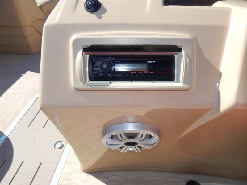 Slide: The Image of 2016 Bennington 24 SSLX boat console with Sony stereo and speaker. - 13