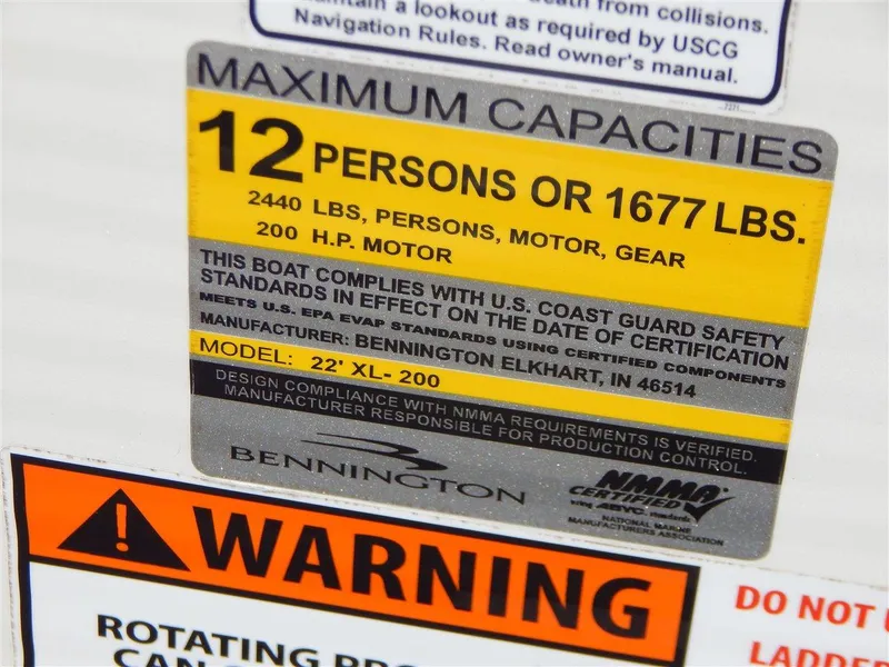 Slide: The Image of Capacity label on 2016 Bennington 24 SSLX boat, max 12 persons or 1677 lbs, 200 HP motor. - 17