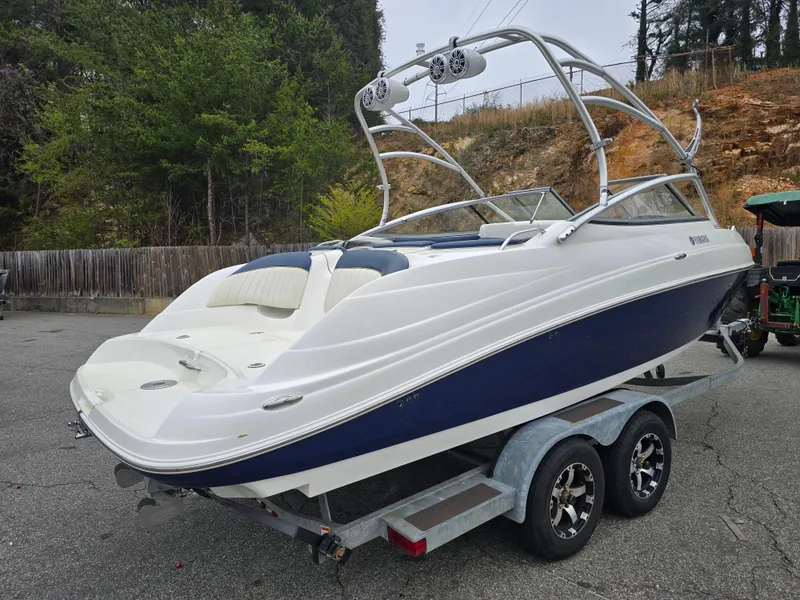Slide: The Image of 2009 Yamaha Boats AR230 HO on trailer, parked outdoors. - 4