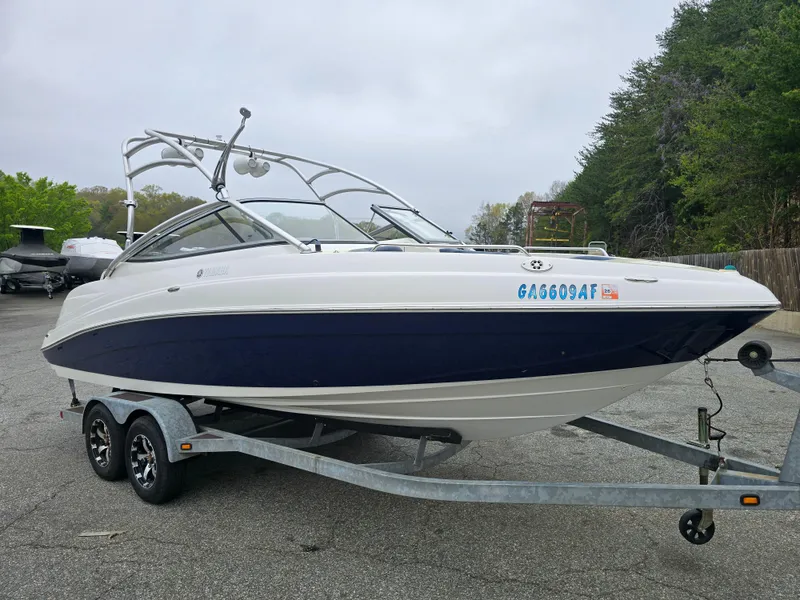 Slide: The Image of 2009 Yamaha Boats AR230 HO on trailer, parked outdoors. - 6
