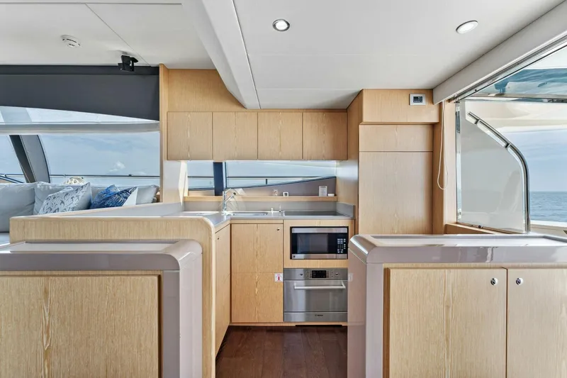 Slide: The Image of Luxurious kitchen interior of 2013 Ferretti Yachts 620 with modern appliances and ocean view. - 10
